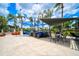 Relaxing outdoor patio area with seating and shade structures at 4726 Sand Trap Street E Cir, Bradenton, FL 34203