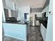 Modern kitchen with stainless steel appliances and granite countertops at 5009 Sturbridge Ct, Sarasota, FL 34238