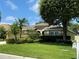 Single story home with lush landscaping at 5009 Sturbridge Ct, Sarasota, FL 34238