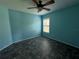 Light and airy bedroom with ceiling fan and window at 5009 Sturbridge Ct, Sarasota, FL 34238