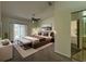 Spacious main bedroom with a king-size bed and access to a private patio at 5524 37Th E St # 0, Bradenton, FL 34203