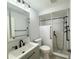 Updated bathroom with a walk-in shower, modern vanity, and fixtures at 5524 37Th E St # 0, Bradenton, FL 34203