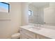 Bathroom with a single sink and shower with subway tile surround at 305 Potenza Loop, Nokomis, FL 34275
