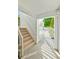 A white staircase leading to an outdoor common area at 6304 Pointe West Blvd # A102, Bradenton, FL 34209
