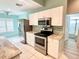 Updated kitchen with stainless steel appliances and granite countertops at 6582 Fairway Gardens Dr # 6582, Bradenton, FL 34203
