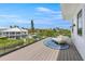 Relaxing deck with water views and outdoor seating at 111 Gull Dr, Anna Maria, FL 34216