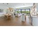 Open living space with water views, hardwood floors, and modern furniture at 111 Gull Dr, Anna Maria, FL 34216