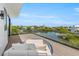 Private deck with water views and comfortable seating at 111 Gull Dr, Anna Maria, FL 34216