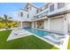 Modern two-story home with pool, patio, and waterfront access at 111 Gull Dr, Anna Maria, FL 34216
