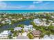 Beautiful waterfront property with amazing water views and lush landscaping at 111 Gull Dr, Anna Maria, FL 34216