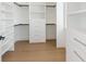 Large walk-in closet with ample shelving and drawers at 111 Gull Dr, Anna Maria, FL 34216