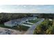 New construction homes with paved driveways and grassy yards at 8233 Givlic Ln, North Port, FL 34287