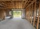 Unfinished living space with large door to backyard at 8233 Givlic Ln, North Port, FL 34287