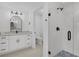 Bathroom featuring a glass-enclosed shower, marble countertops, and updated fixtures at 280 Hidden Bay Dr # 203, Osprey, FL 34229