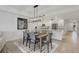 Well-lit dining area next to the kitchen, perfect for Gathering meals and entertaining at 280 Hidden Bay Dr # 302, Osprey, FL 34229