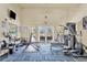 Fitness center featuring various weight machines, free weights, and mirrors at 280 Hidden Bay Dr # 302, Osprey, FL 34229
