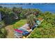 Outdoor kayak storage rack with colorful kayaks for residents' use at 280 Hidden Bay Dr # 302, Osprey, FL 34229