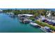 Waterfront featuring docks, boats, a restaurant, and convenient parking at 280 Hidden Bay Dr # 302, Osprey, FL 34229