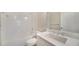 Clean bathroom with a single vanity and shower/tub combo at 100 Corserra Dr, Nokomis, FL 34275