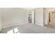 Spacious bedroom with an open floor plan and neutral decor at 100 Corserra Dr, Nokomis, FL 34275