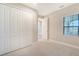 Bright bedroom with a large closet and neutral tones at 100 Corserra Dr, Nokomis, FL 34275