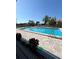 Inviting community pool with plenty of lounge chairs at 2333 Feather Sound Dr # B407, Clearwater, FL 33762