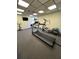 Community fitness center featuring treadmills, elliptical, and stationary bike at 2333 Feather Sound Dr # B407, Clearwater, FL 33762