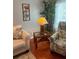 Bright living room with coastal-themed decor and wicker furniture at 250 Cape Harbour Loop # 106, Bradenton, FL 34212