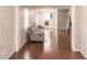 Hardwood floor living room with view of kitchen and access to other rooms at 6029 Lilli Way # 6029, Bradenton, FL 34207