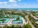 Aerial view of condo community near beach at 5641 Midnight Pass Rd # 902, Sarasota, FL 34242