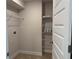 Pantry with built-in wire shelving, providing ample storage space at 855 Cumberland Rd, Venice, FL 34293