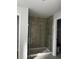 Modern bathroom with a large shower and neutral tile at 2679 Englewood Rd, Venice, FL 34293