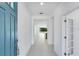 Inviting foyer featuring modern tile flooring and a view into the main living space at 1580 Laurel Brook Ln, Port Charlotte, FL 33953