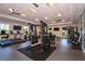 Community gym featuring modern equipment, providing residents with a convenient fitness option at 1580 Laurel Brook Ln, Port Charlotte, FL 33953