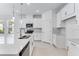 Island view in a modern kitchen featuring stainless appliances, quartz countertops, and pendant lighting at 1580 Laurel Brook Ln, Port Charlotte, FL 33953