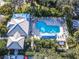 Aerial view of community pool and clubhouse at 915 Barclay Ct, Venice, FL 34293