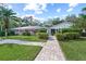 Lovely single-story home boasts beautiful landscaping and a screened-in patio, perfect for enjoying the outdoors at 3666 Bonaventure Ct, Sarasota, FL 34243
