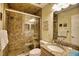 Updated bathroom with a large shower and granite vanity at 301 S Gulf Blvd # 20, Placida, FL 33946