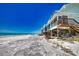 Row of beach houses with decks overlooking the ocean at 301 S Gulf Blvd # 20, Placida, FL 33946