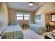 Charming bedroom with twin beds and plenty of natural light at 301 S Gulf Blvd # 20, Placida, FL 33946