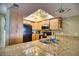 Kitchen boasts granite countertops and modern appliances at 301 S Gulf Blvd # 20, Placida, FL 33946