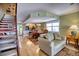 Living room with hardwood floors and comfy seating at 301 S Gulf Blvd # 20, Placida, FL 33946
