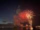 Stunning fireworks display over the water, with vibrant colors illuminating the night sky at 1425 Park Beach Cir # 122, Punta Gorda, FL 33950