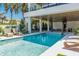Stunning pool with spa, and plenty of lounge chairs at 809 N Shore Dr, Anna Maria, FL 34216
