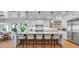 Spacious kitchen with large island and white cabinets at 809 N Shore Dr, Anna Maria, FL 34216