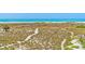 Stunning beach and dune landscape with walking paths at 809 N Shore Dr, Anna Maria, FL 34216