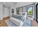 Main bedroom with ocean views and comfortable bedding at 809 N Shore Dr, Anna Maria, FL 34216