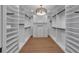 Spacious walk-in closet with ample shelving and hanging space at 809 N Shore Dr, Anna Maria, FL 34216