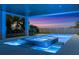 Relaxing spa with blue lighting and sleek tile work at 809 N Shore Dr, Anna Maria, FL 34216