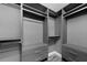 Large walk-in closet with ample shelving and drawers at 1425 Park Beach Cir # 122, Punta Gorda, FL 33950
